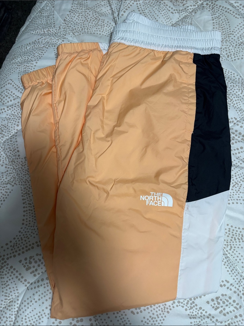 The North Face Peach and Black Colorblock Track Pants